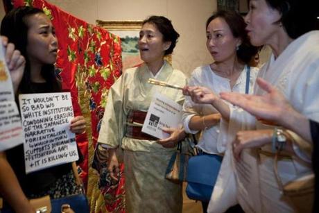 Matsuko Levin (center), Danyeun Kim, and Etsuko Yashiro were at odds with a group of younger women protesting at the MFA.
