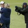 Zach Johnson of the U.S. hugs his wife Kim Barclay after winning the British Open golf championship on the Old Course in St. Andrews, Scotland, July 20, 2015 REUTERS/Paul Childs