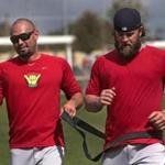 Fort Myers, FL - 02/23/15 - Boston Red Sox right fielder Shane Victorino works out with resistance bands with Boston Red Sox first baseman Mike Napoli (12) at the end of today's informal workout. Red Sox Spring Training. (Barry Chin/Globe Staff), Section: Sports, Reporter: Peter Abraham, Topic: 24Red Sox, LOID: 8.0.2717390732. 