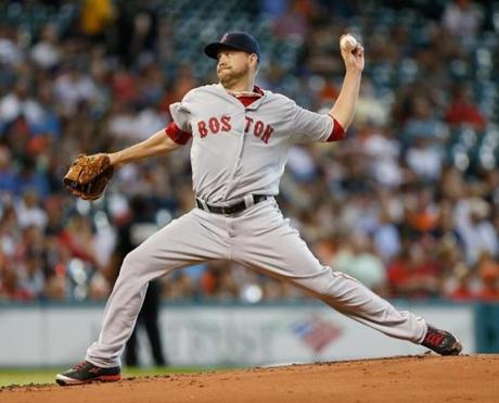 HOUSTON, TX - JULY 21: Brian Johnson #61 of the Boston Red Sox throws in the first inning against the Houston Astros at Minute Maid Park on July 21, 2015 in Houston, Texas. (Photo by Bob Levey/Getty Images)
