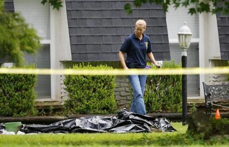 Five people were found stabbed to death inside a well-kept suburban Tulsa home.

