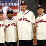 ADVANCE FOR WEEKEND EDITIONS, JUNE 24-26 - FILE - In this Jan. 7, 2015, file photo, members of the National Baseball Hall of Fame 2015 inductee class, from left, Craig Biggio, Pedro Martinez, Randy Johnson and John Smoltz pose for photographers at the MLB Network's Studio 42 in Secaucus, N.J. All four will be inducted Sunday, July 26, 2015, in Cooperstown. (AP Photo/Julio Cortez, File)