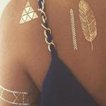 Degelis Tufts, a Nahant native, has started a company that offers temporary metallic tattoos called TribeTats.