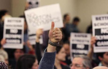 A supporter of the Boston Olympic bid gave a thumbs up during a forum in February.
