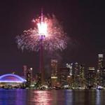 Fireworks exploded from the CN Tower over downtown Toronto during the closing ceremonies of the Pan Am Games Sunday.