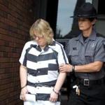 Joyce Mitchell was escorted out of court after pleading guilty in Plattsburgh, N.Y., on Tuesday.
