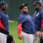 Fort Myers, FL - 02/27/15 - The three amigos Boston Red Sox outfielder Hanley Ramirez, Red Sox designated hitter David Ortiz, and Red Sox third baseman Pablo Sandoval get together at the start of the morning conditioning drills. Red Sox Spring Training. (Barry Chin/Globe Staff), Section: Sports, Reporter: Peter Abraham, Topic: 28Red Sox, LOID: 8.0.2826364469. 
