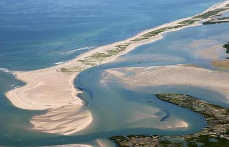 Eastham and Orleans are divided on jurisdiction over a barrier beach known as the Nauset Spit, which originated in Orleans but grew over the Eastham border.
