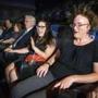 Kathleen Boyd (right) and Kristin Livingston reacted to water mist in the MX4D theater at Showcase Cinema de Lux.