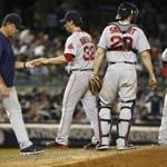John Farrell (left) and the Red Sox need to solve their pitching issues.