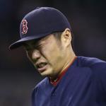Koji Uehara was helped off the field by a trainer after being struck on the wrist Friday night. 