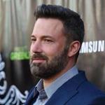 Page Six says Christine Ouzounian took a trip with Ben Affleck (pictured) and Tom Brady. 