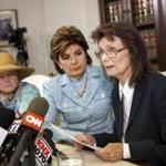 Linda Ridgeway Whitedeer (R), a former actress, speaks about an alleged assault by Bill Cosby as attorney Gloria Allred (C) and Colleen Hughes (L) look on during a news conference with new accusers against comedian Bill Cosby at Allred's office in Los Angeles, California August 12, 2015. Three more women accused comedian Bill Cosby of sexual assault on Wednesday, providing detailed allegations of abuse they said the veteran television star subjected them to decades ago. REUTERS/Patrick T. Fallon