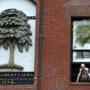 A wall sculpture pays tribute to the Liberty Tree.