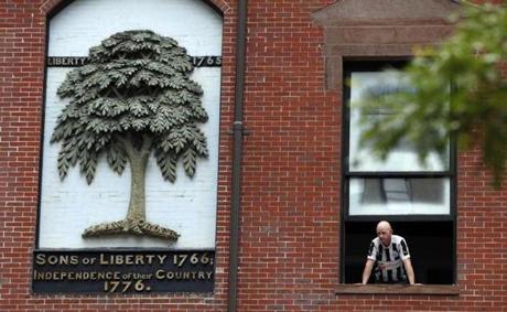A wall sculpture pays tribute to the Liberty Tree.
