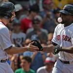 Jackie Bradley Jr. (right) hit two home runs against the Mariners on Saturday.