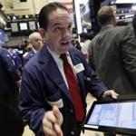 Trader Tommy Kalikas worked on the floor of the New York Stock Exchange on Wednesday.