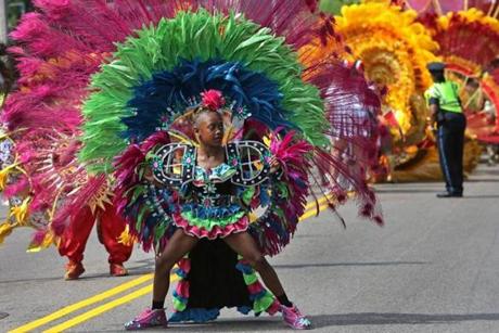 Participants danced in Boston's annual Carnival Day parade on Saturday.
