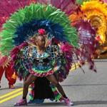 Participants danced in Boston's annual Carnival Day parade on Saturday.