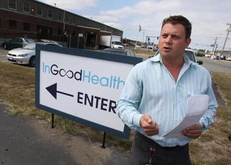 David Noble, president of In Good Health,  discussed opening day with media outside his facility.
