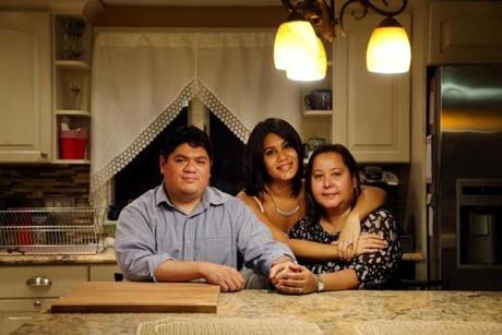Maria Sanchez-Lopez (right), with husband Lyle Lopez and daughter Felicia Torres, sought an affordable home for years.
