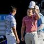 Taking off your cap is shake hands after a round, as Zach Johnson (right) and Rickie Fowler did, is golf etiquette that many have picked up from watching the professionals on television. 