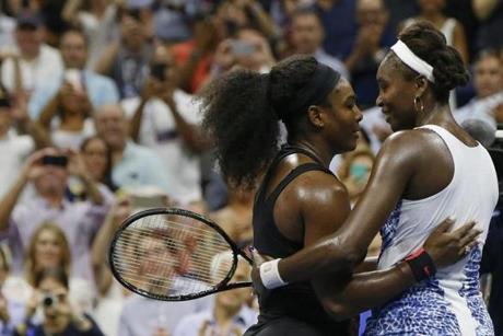 Serena Williams embraced her sister and compatriot Venus Williams after defeating her in their quarterfinals match.
