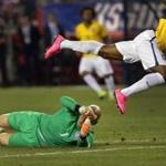 After colliding with US goalkeeper Brad Guzan, Brazil?s Douglas Costa is in for a rough landing.