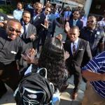 Students at the Lilla G. Frederick Middle School were welcomed with cheers and high-fives. 