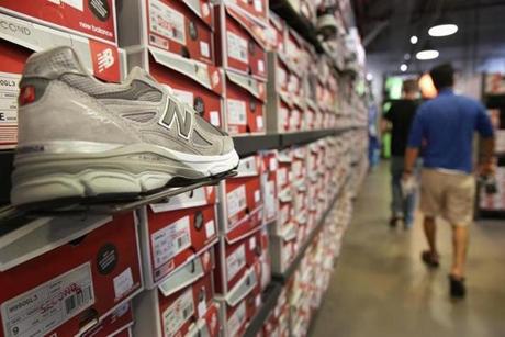 The men?s gray 990 shoe was on display at the New Balance outlet in Brighton. The shoe has been popular for three decades.
