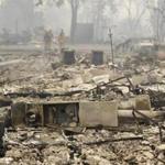 The remains of several homes destroyed by fire were seen Sunday in Middletown, Calif.