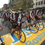 Several hundred cyclists biked from Ground Zero in New York to the Boston Marathon finish line.