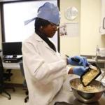 Metabolic technician Lisa West made a batch of banana bread bars at the metabolic test kitchen inside Brigham and Women?s Hospital. The bars came about by accident after a batch of banana bread didn?t rise.