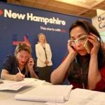 Letizia Ortiz (front) and Katie Gladstone handled phones at Hillary Clinton?s headquarters in Manchester, N.H.