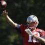 New England Patriots quarterback Tom Brady throws a pass during NFL football practice, Wednesday, Sept. 23, 2015, in Foxborough, Mass. (AP Photo/Steven Senne)