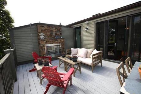 The deck off of the master suite is 270-square-foot and features a gas fireplace with a ledge-stone facade.
