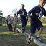 Nantucket Boy Scouts on the Camp Richard obstacle course.