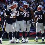 LeGarrette Blount (left) and the Patriots improved to 3-0 Sunday.