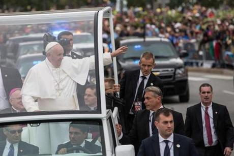 Pope Francis waved to the crowd in Philadelphia Sunday. 
