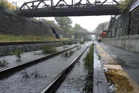 The tracks were flooded at the Natick station along the Framingham/Worcester line of the commuter rail.
