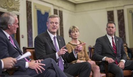 Governor Charlie Baker (second from left) spoke Monday during a panel discussion at the Edward M. Kennedy Institute about the state?s opioid epidemic.
