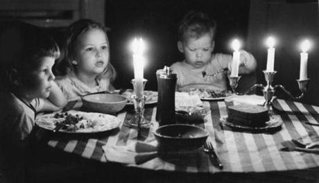 The  O'connell children photographed at their home on Bellevue Street during Boston's blackout. 
