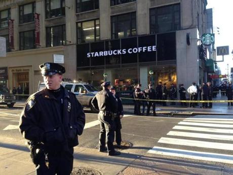 New York City officers investigated a shooting at 35th Street and Eighth Avenue on Monday.
