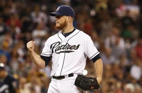 San Diego Padres closer Craig Kimbrel pumps his fist after striking out the final batter against the Milwaukee Brewers in the ninth inning of a baseball game won 3-1 by the Padres Thursday, Oct. 1, 2015, in San Diego. (AP Photo/Lenny Ignelzi)
