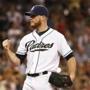 San Diego Padres closer Craig Kimbrel pumps his fist after striking out the final batter against the Milwaukee Brewers in the ninth inning of a baseball game won 3-1 by the Padres Thursday, Oct. 1, 2015, in San Diego. (AP Photo/Lenny Ignelzi)