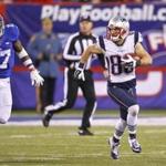New England Patriots' Danny Amendola (80) runs away from New York Giants' Dwayne Harris (17) on a punt return during the second half of an NFL football game Sunday Nov. 15, 2015, in East Rutherford, N.J. (AP Photo/Gary Hershorn)