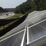 A solar panel farm along the Massachusetts Turnpike in Natick. 