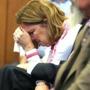 Peggie Ritzer put her head in her hands Monday while listening to proceedings in the trial of Philip D. Chism. Chism, then 14, is accused of killing Ritzer?s daughter, Colleen, in October 2013.