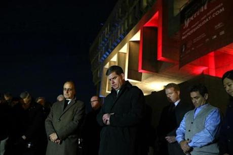 Boston Mayor Marty Walsh(right) and Valery Freland, Consul General of France in Boston, bowed their heads for the victims of the recent Paris terrorist attack. 
