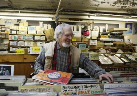 Co-owner of In Your Ear record store Reed Lappin inside his store in 2013.)
